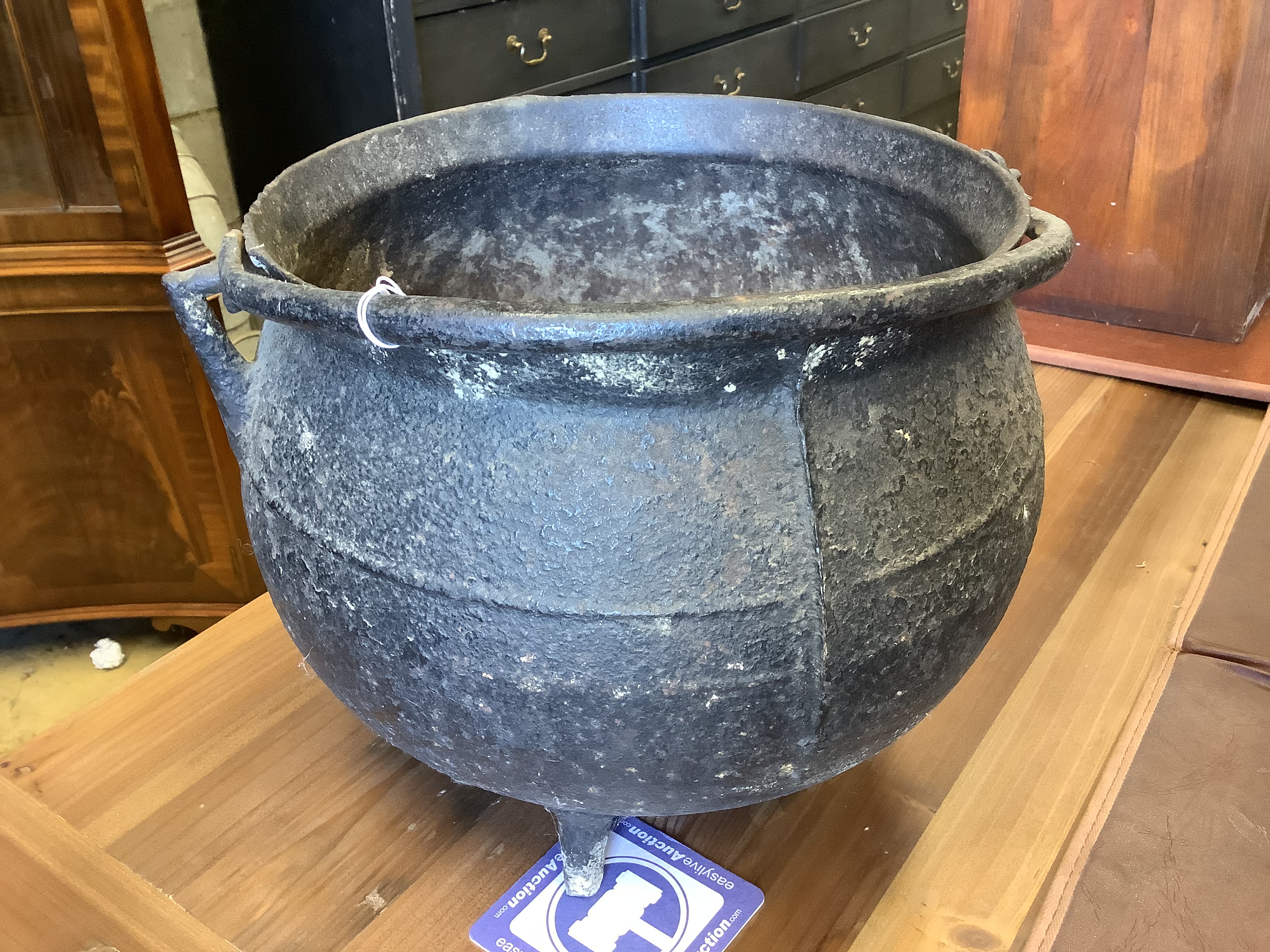 A cast iron cauldron, diameter 31cm, height 28cm